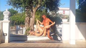 Selena, a hot MILF with beautiful breasts, takes her yoga routine outdoors