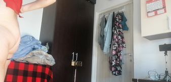 Amateur Wife Dancing Naked at Home. Amateur Woman Has Fun Trying on Clothes and Cutting Them.