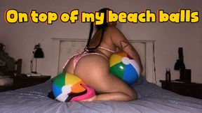 On top of my beach balls
