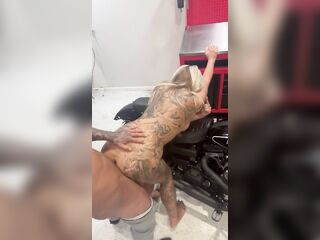 Tattooed golden-haired gets drilled on a Harley