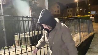 Woman on street gets offered a cigarette to flash and piss inside outdoors