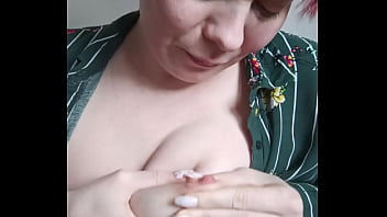 Mature milf plays with her nipples and big tits