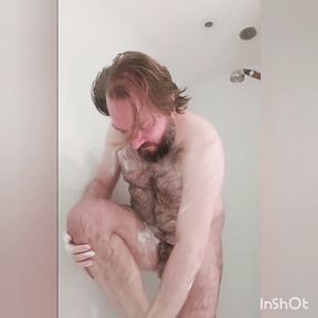 Chastity locked bear unlocks, showers and relocks cock