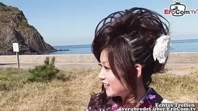 Skinny Asian girl in traditional outfit takes stiff drill