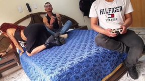 Latino guy and his friends get into it at a gaming session