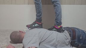 Chrissy jumping on Dan with puma shoes