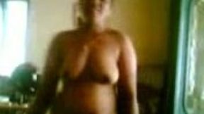 Chunky dark skin aunty flashes her thick body on cam