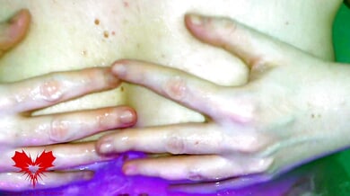 German dominatrix gives a powerful titjob in a beachside hot tub