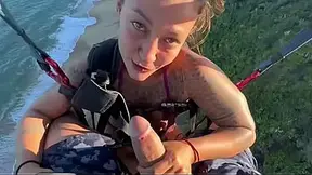 Brunette HOT MOM gives drenched head to giant rod on a paragliding platform