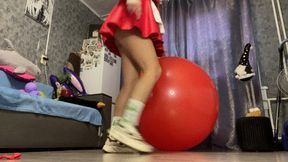 Val jump in dress on big red ball