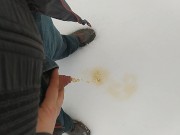 Pee on snow outdoor