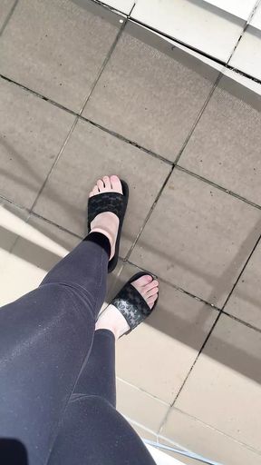 Feet in Flip-flops and Walking in Flip-flops