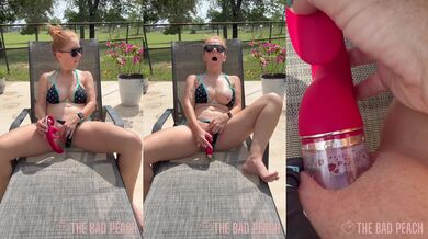 Bikini babe vibes solo with her toy by the pool