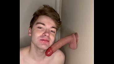 Cock Hungry Twink Slobbers on Giant Dildo!