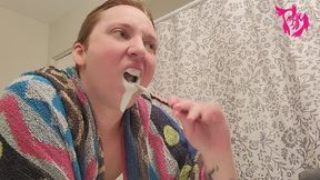 Brushing Teeth and Scrubbing Tongue with Hair up and Blue Towel around Shoulders