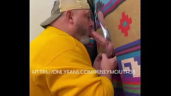 Pussymouth deepthroats and performs amazing finger work to nuts of hot cock, through glory hole.