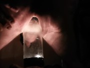 PV TAking Lit Glass Bottle With Head In Back Porch