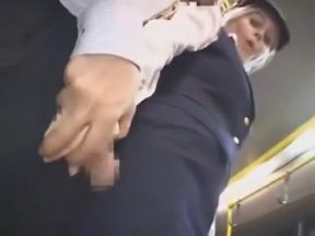 Busty stewardess gives handjob on bus, takes cumshot