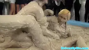 European hotties enjoy wrestling in mud