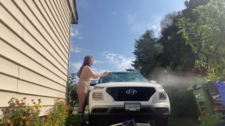 Sneaky neighbour watches MILF wash car in skin coloured dress