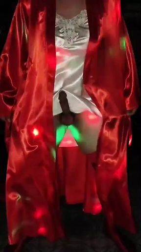 Dancing in a red pajama dress.