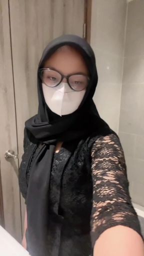 Sexy kebaya hijab playing in the toilet