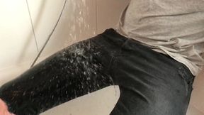 Wet black skinny ripped jeans in the shower