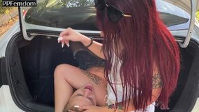 mistress sofi humiliates her slave with spitting in the trunk of her car