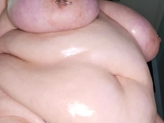 Busty curly brunette with big boobs fucks on couch