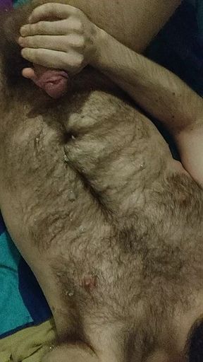 Hairy guy works his hole and shoots a big load