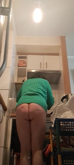 Mom in the kitchen seducing without panties