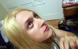 Sissy in chastity sucking cock