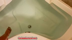 Carissa as Santa’s helper playing in the garden tub and gagged