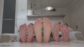 Two small feet between the big sole