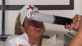 Mature Nurse Spreads Wide for Intense Toy Play While Sucking