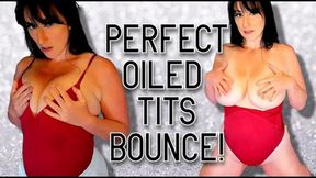 Oiled breasts dildo riding