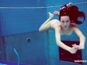 Hot teen Martina swims naked underwater
