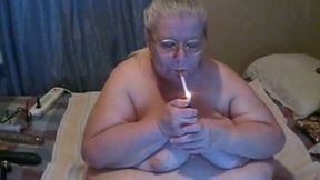 Webcam solo with nude obese granny smoking a cigarette