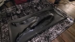 Cute twink tormented in latex vacbed