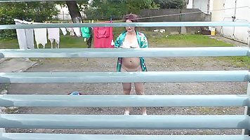 Peeping on pregnant neighbor who was drying clothes in yard without bra and panties