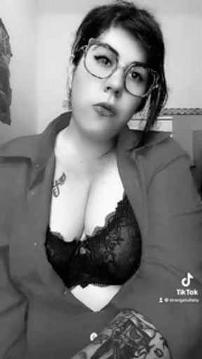 Sexy nerd girl smokes