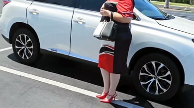 Mature American woman explores her big ass with a toy in a dim warehouse