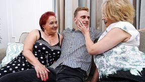 ”Two naughty mature sluts getting banged by one younger guy”