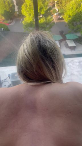 Woman looking out window