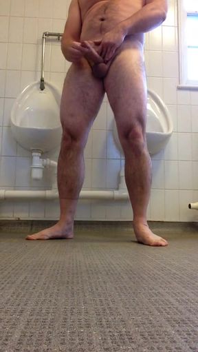 Naked wank in a pub toilet