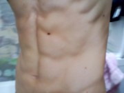 hot man flexing his muscles