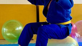 Karate Guy Sitpops 14 Giant 24inch Balloons in a Dojo