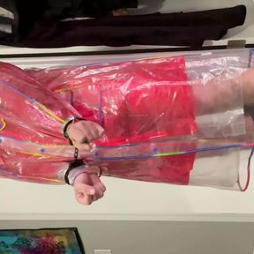 Layering multiple plastic raincoats and bondage