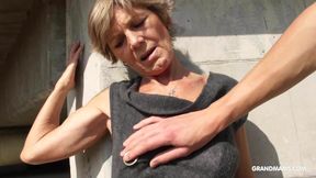 Hot tattooed grandma enjoys giving blowjob