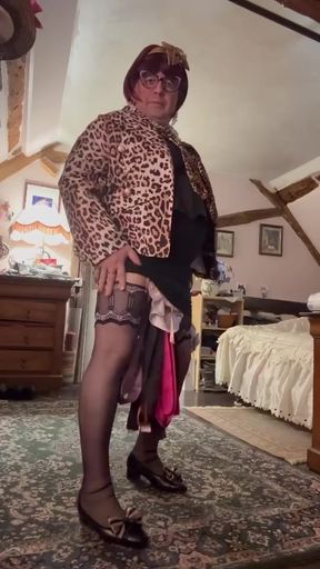 dressed in a shiny little black dress for an evening out